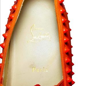 Christian Louboutin red roller boats